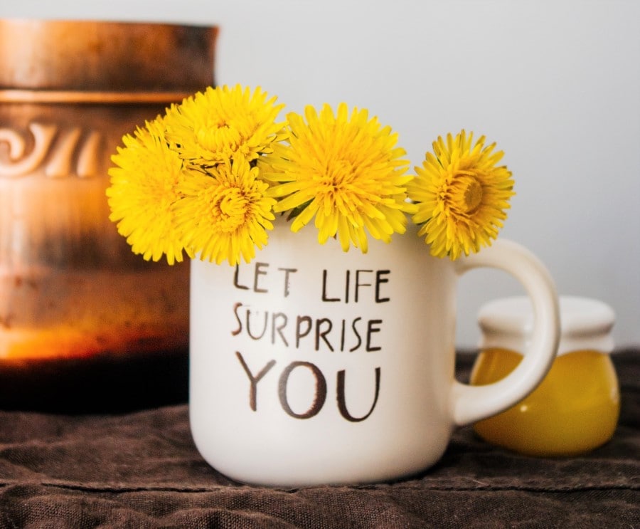 Creating A Morning Routine For Positivity With A Motivational Quote On A Coffee Mug